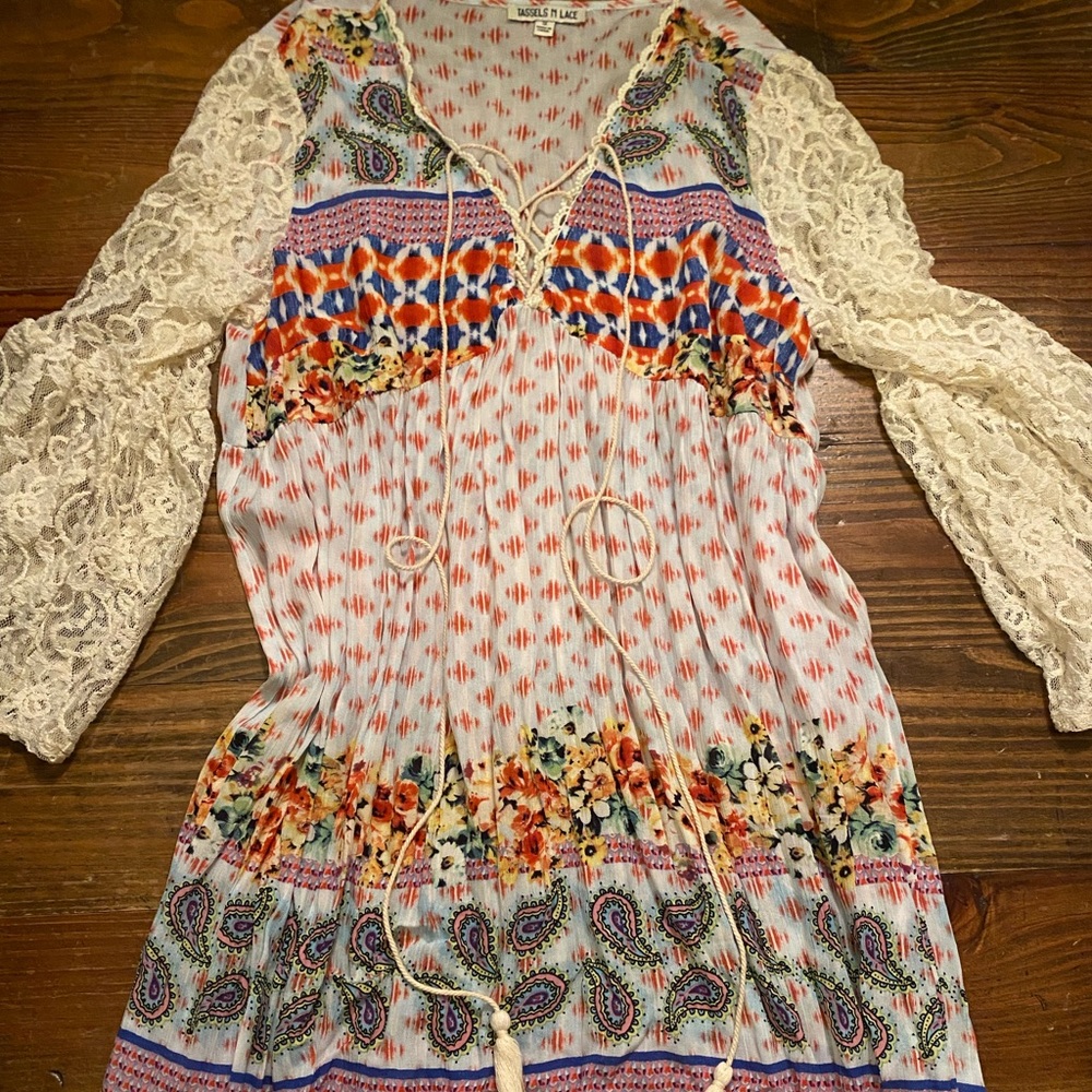 Worn once. Multi colored dress with tassel tie.
